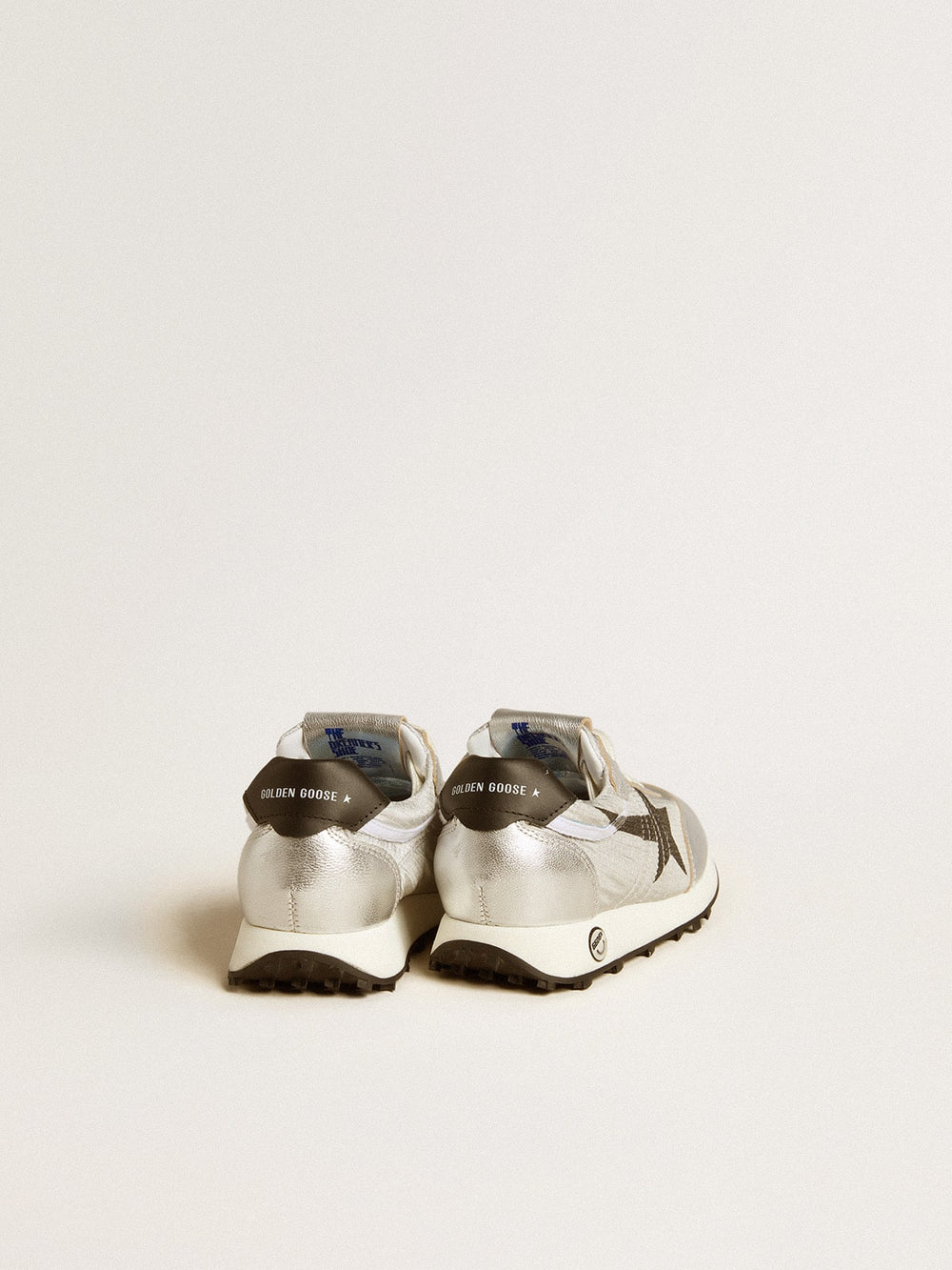 Junior Marathon in silver nylon with black star and leather heel tab