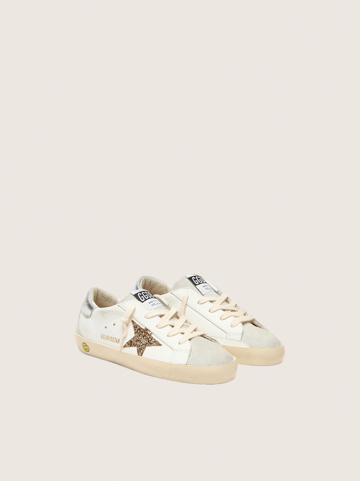 Junior Super-Star with gold glitter star and silver metallic leather heel tab