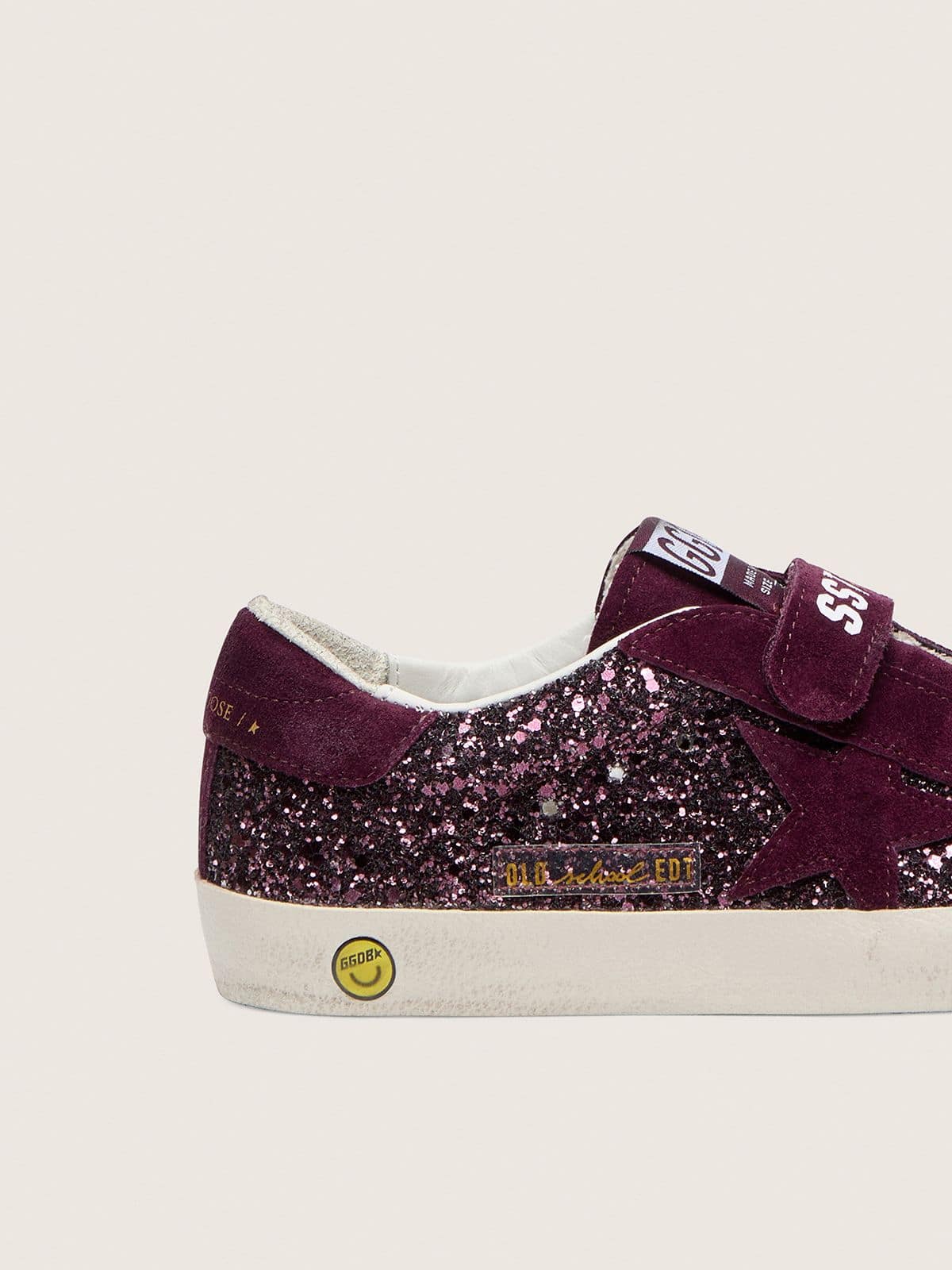 Junior Old School in burgundy glitter with burgundy suede star and heel tab