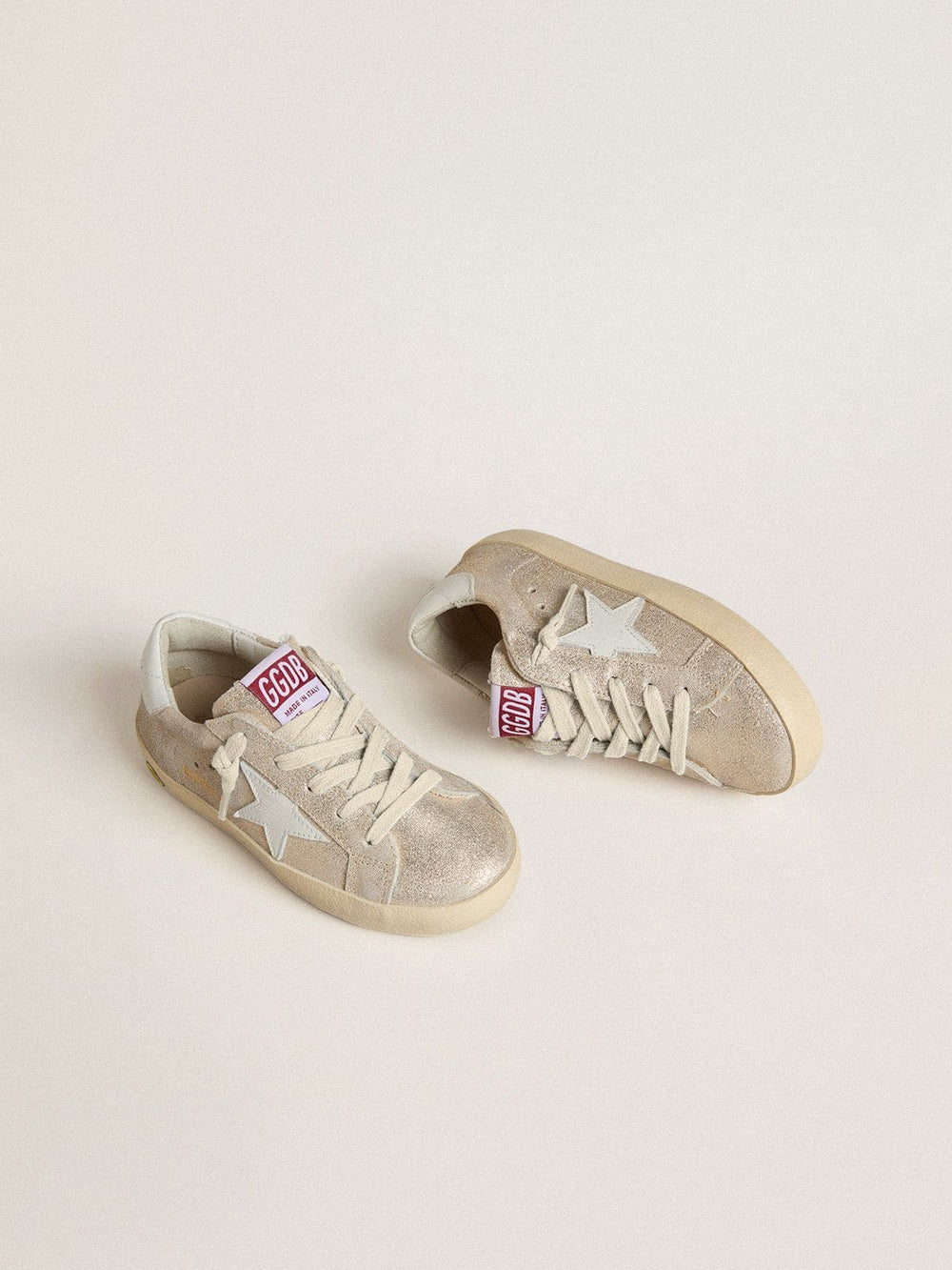 Junior Super-Star in sand-colored laminated-effect suede with white leather star