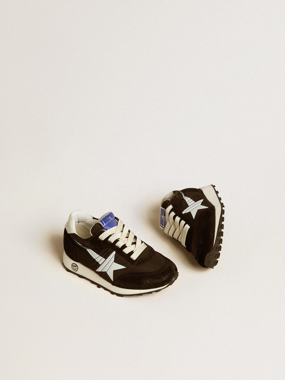 Junior Marathon in black nylon with printed star and leather heel tab