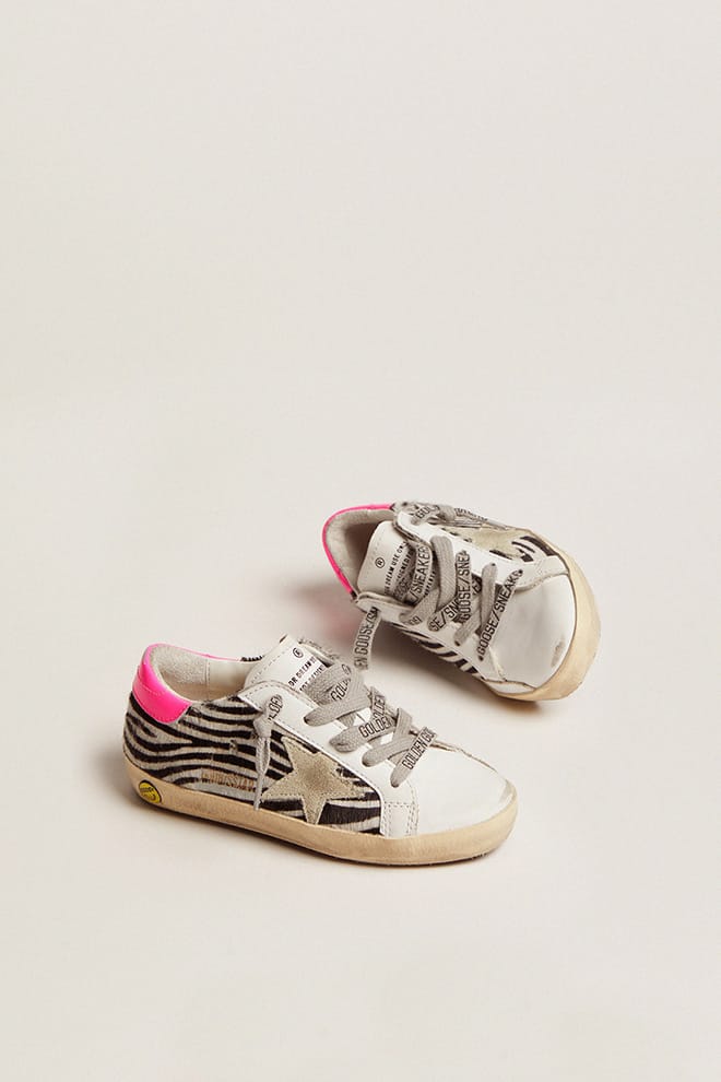 Junior Super-Star in leather and zebra-print pony skin with fuchsia heel tab