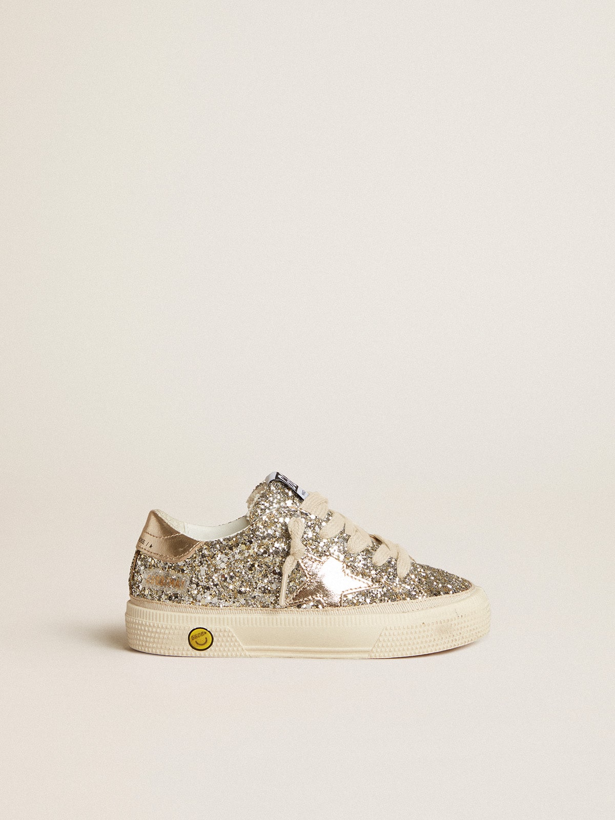 May Junior in platinum glitter with metallic leather star and heel tab
