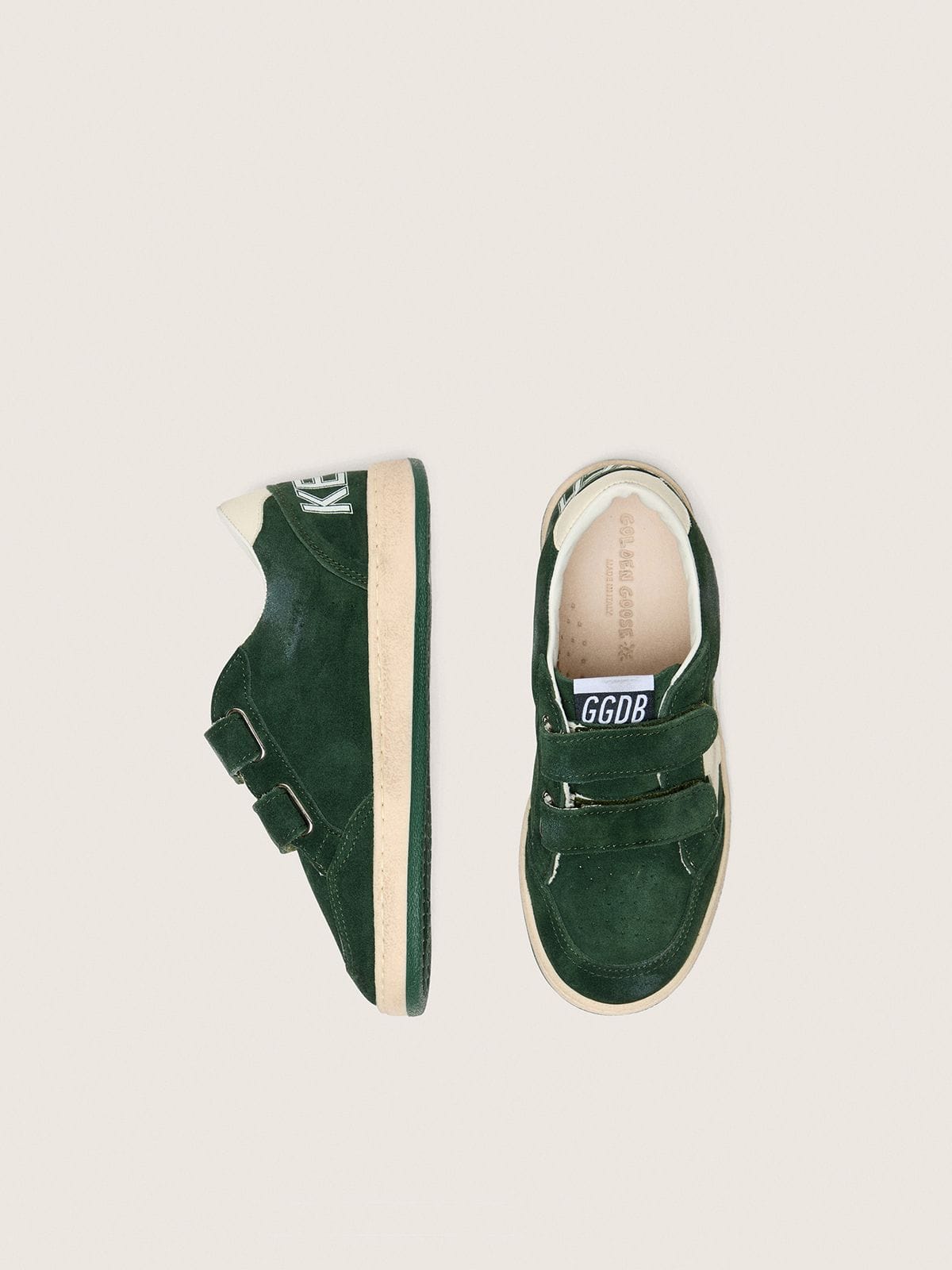 Junior Ball Star in forest-green suede with cream leather star and heel tab