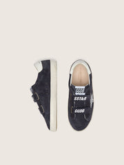 Junior Old School in blue suede with silver glitter star and white leather heel tab