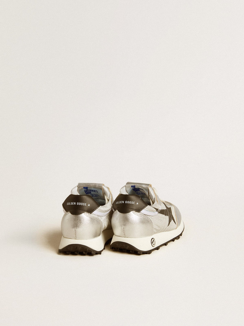Marathon Young in silver nylon with black star and leather heel tab