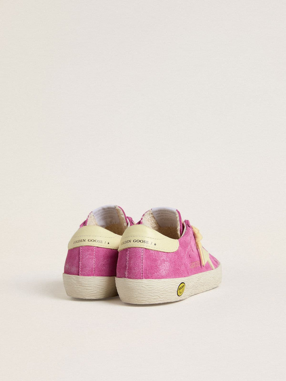 Junior Super-Star in pink suede with light yellow star and heel tab