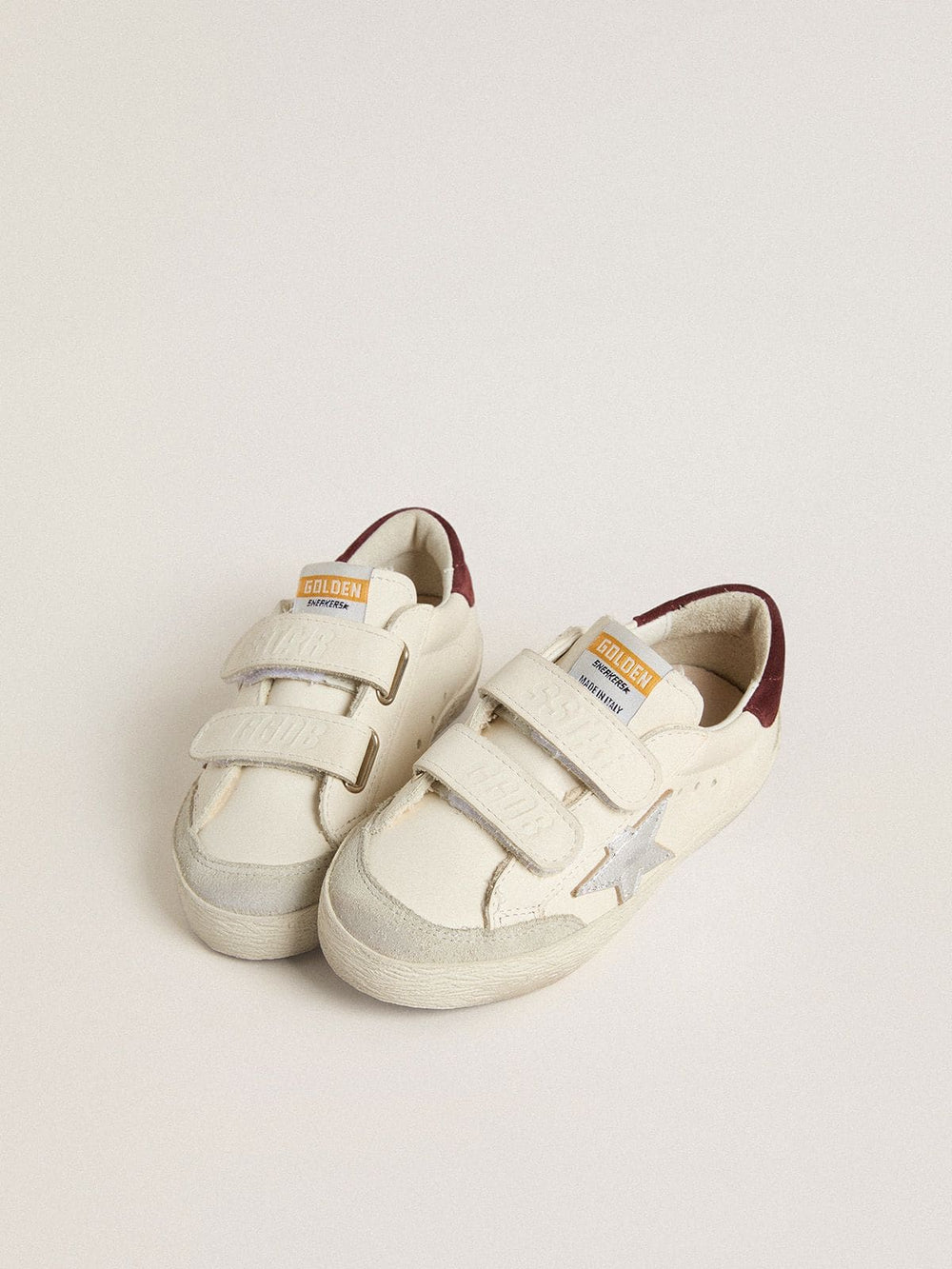 Young Old School with silver metallic leather star and purple suede heel tab