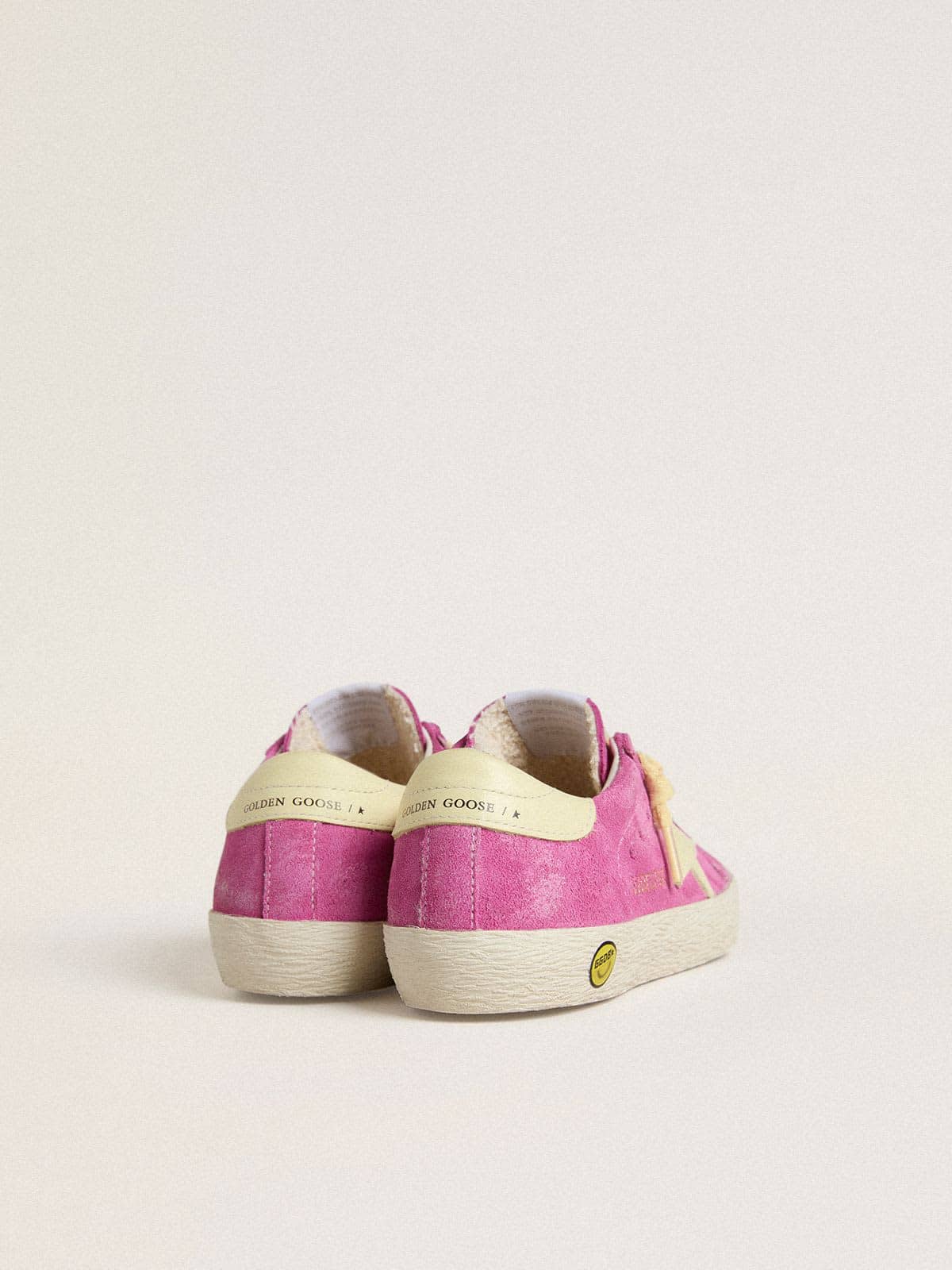 Young Super-Star in pink suede with light yellow star and heel tab