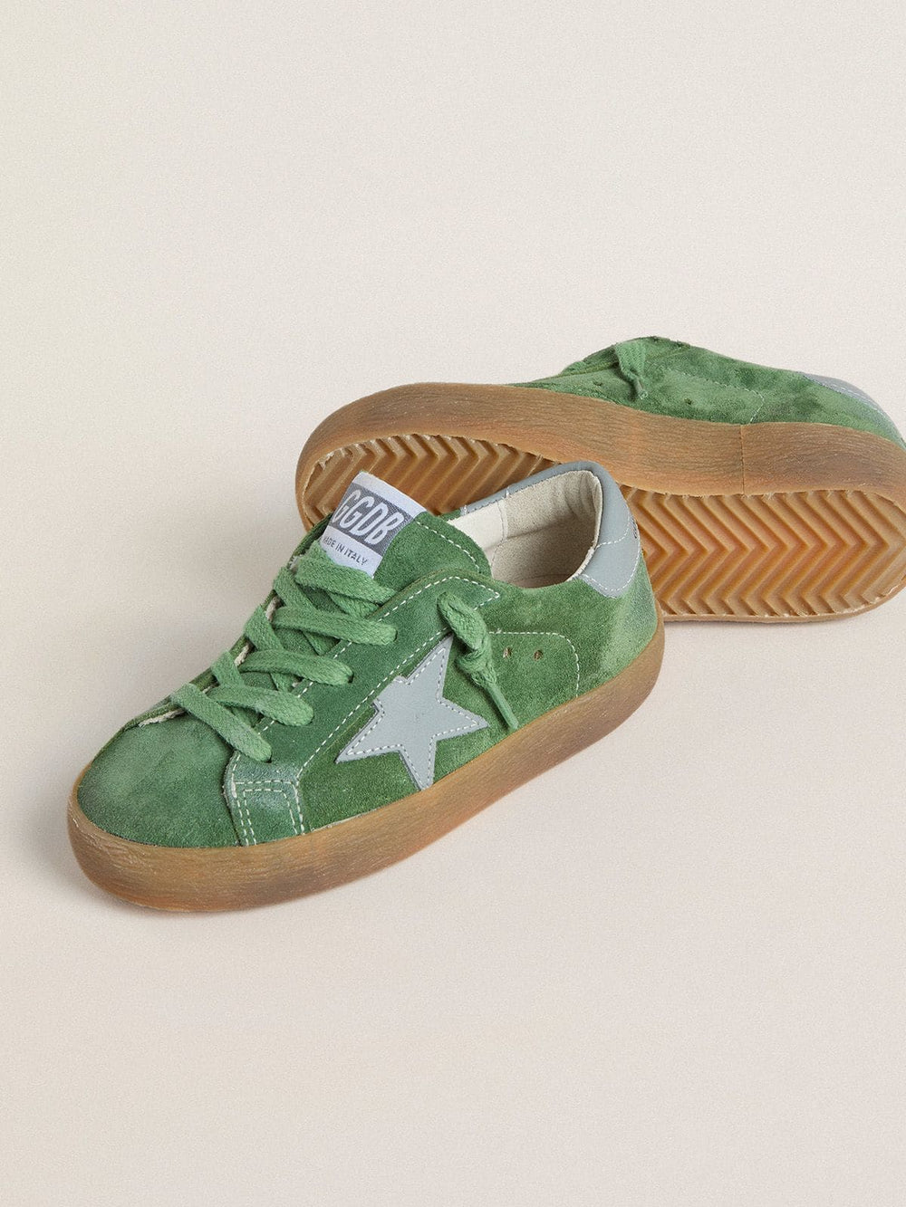Young Super-Star in green suede with baby blue star and heel tab