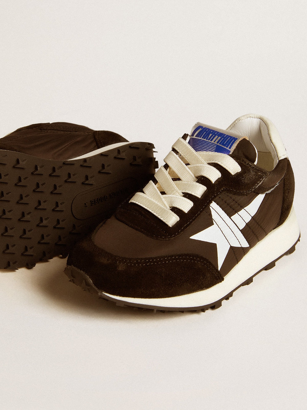 Young Marathon in black nylon with printed star and leather heel tab