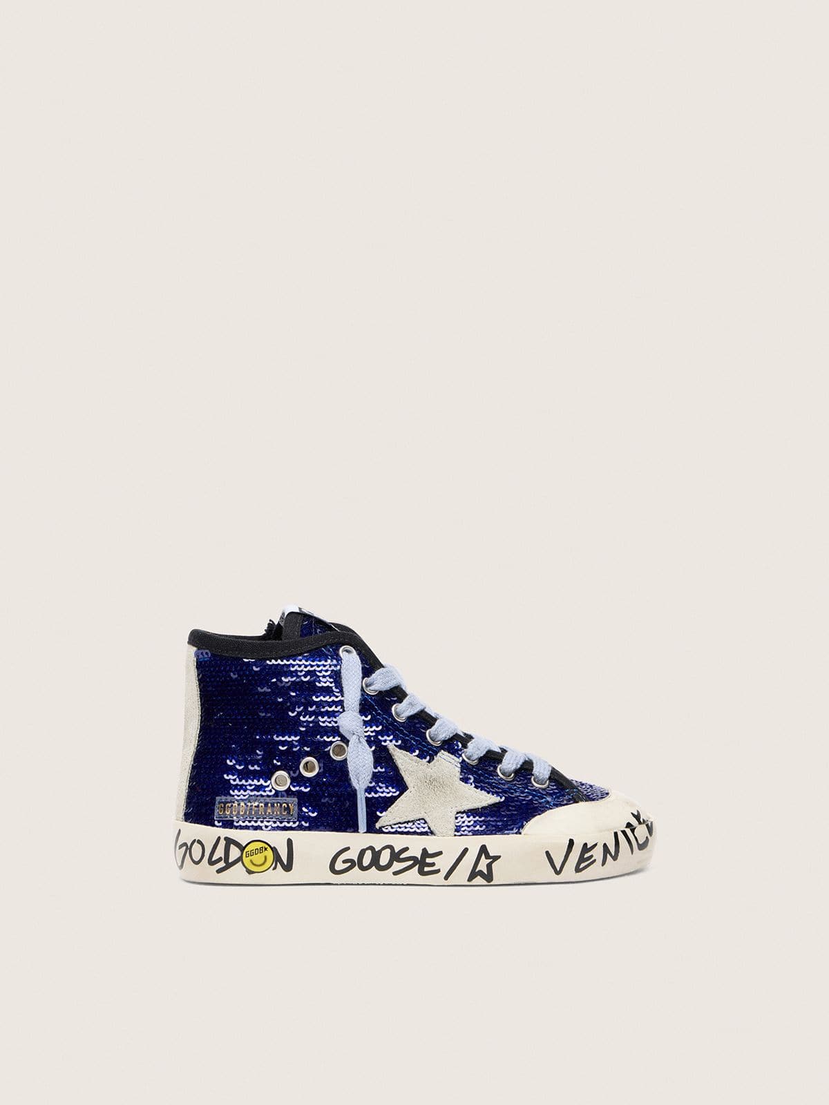 Young Francy Penstar in blue sequins with white suede star