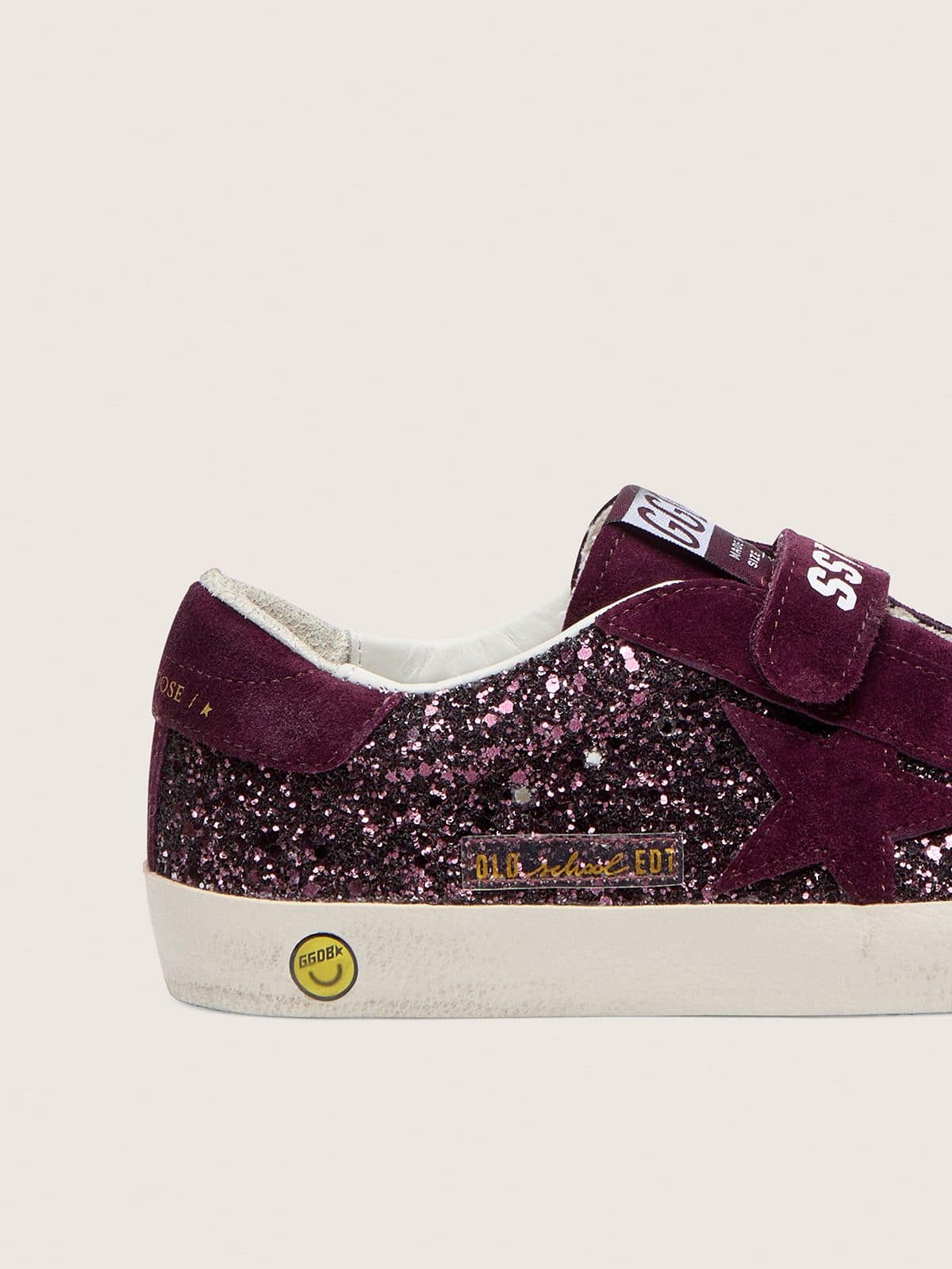 Young Old School in burgundy glitter with burgundy suede star and heel tab