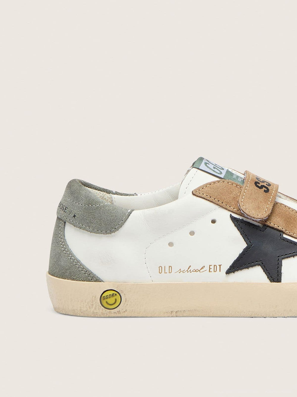 Young Old School with black leather star and beige and green suede inserts