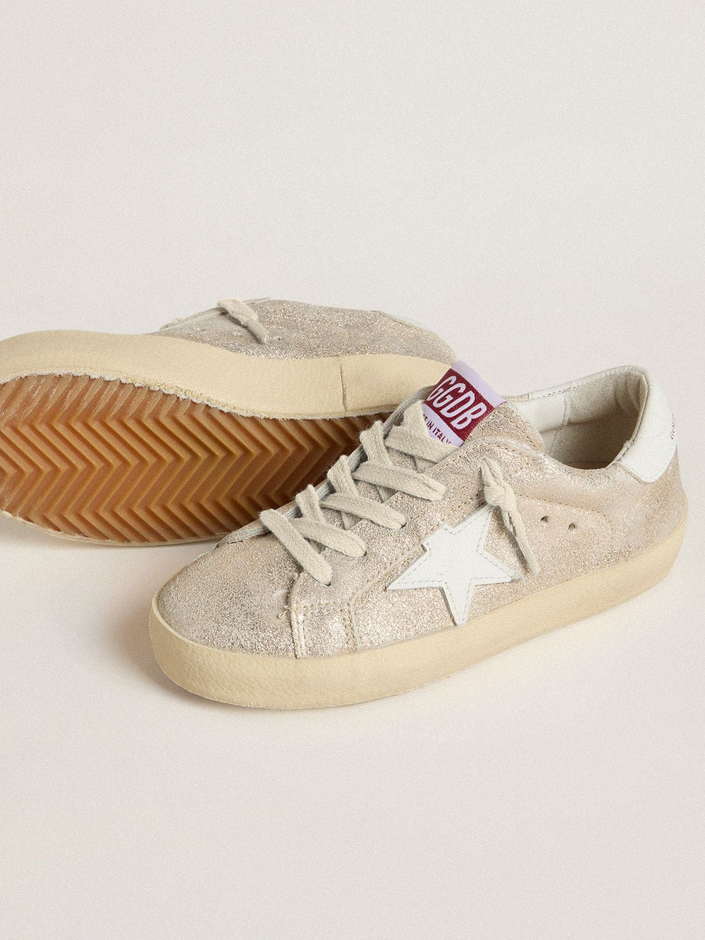 Young Super-Star in sand-colored laminated-effect suede with white leather star