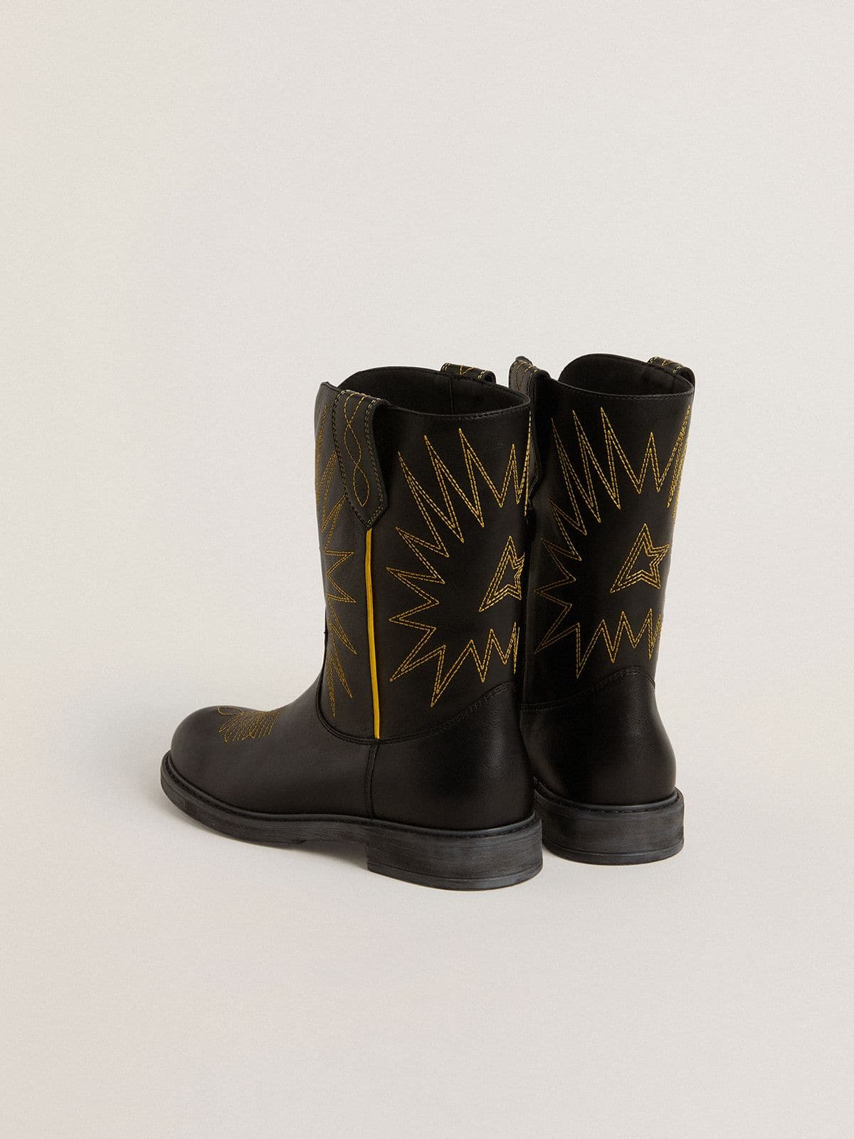 Wish Teen boots in black leather with yellow star embroidery