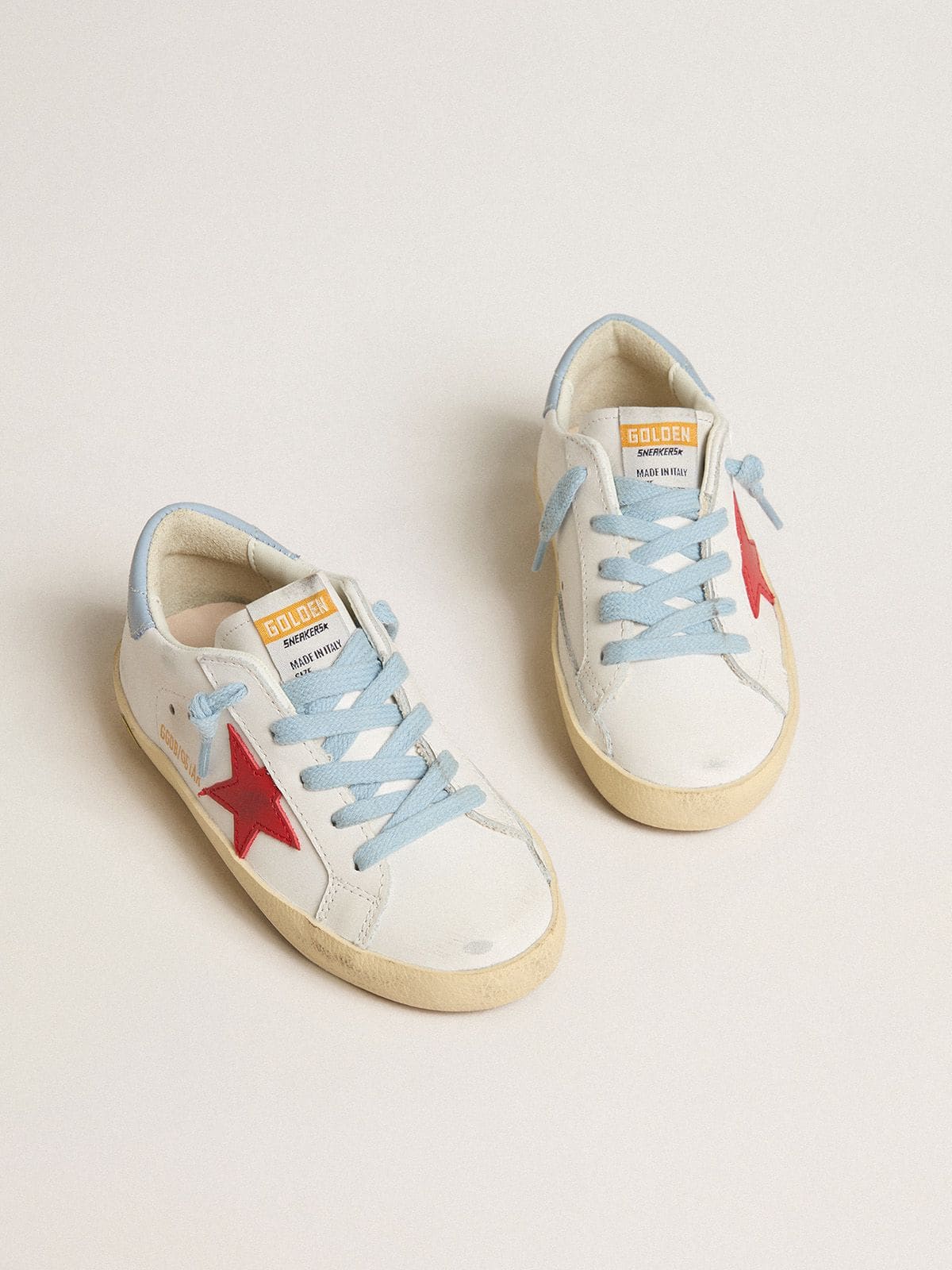 Super-Star Young in white leather with red star and light blue heel tab