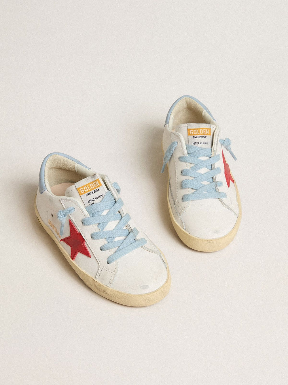 Super-Star Young in white leather with red star and light blue heel tab