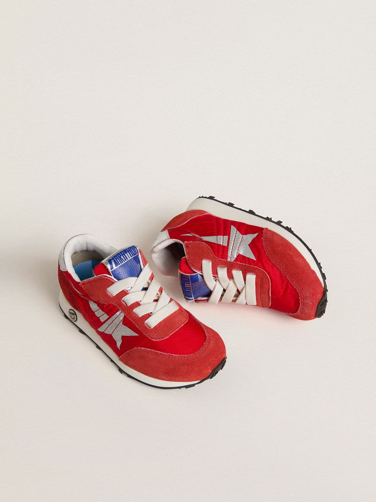 Young Marathon in red nylon with printed star and leather heel tab