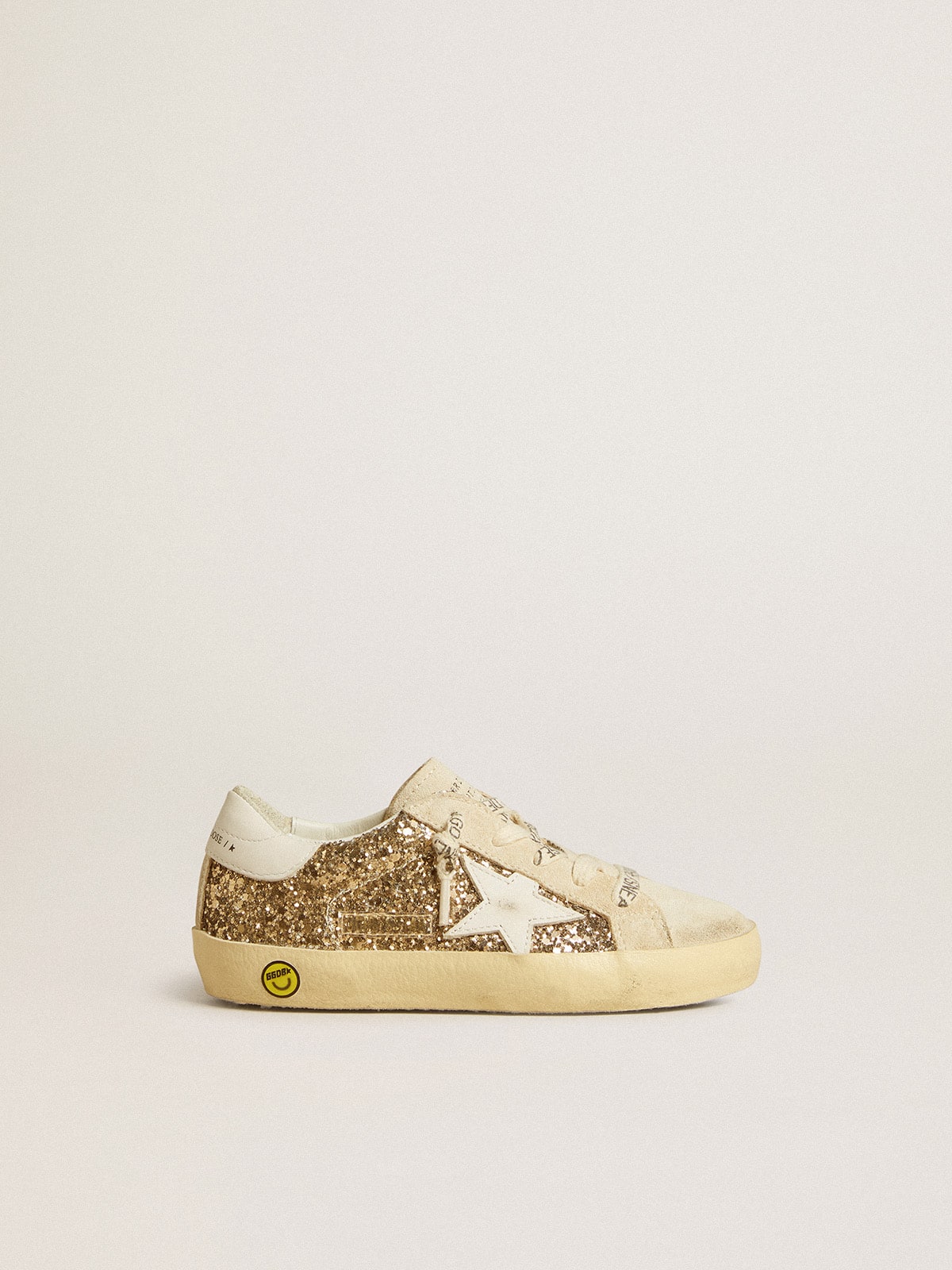 Super-Star Young in gold glitter with white leather star and heel tab