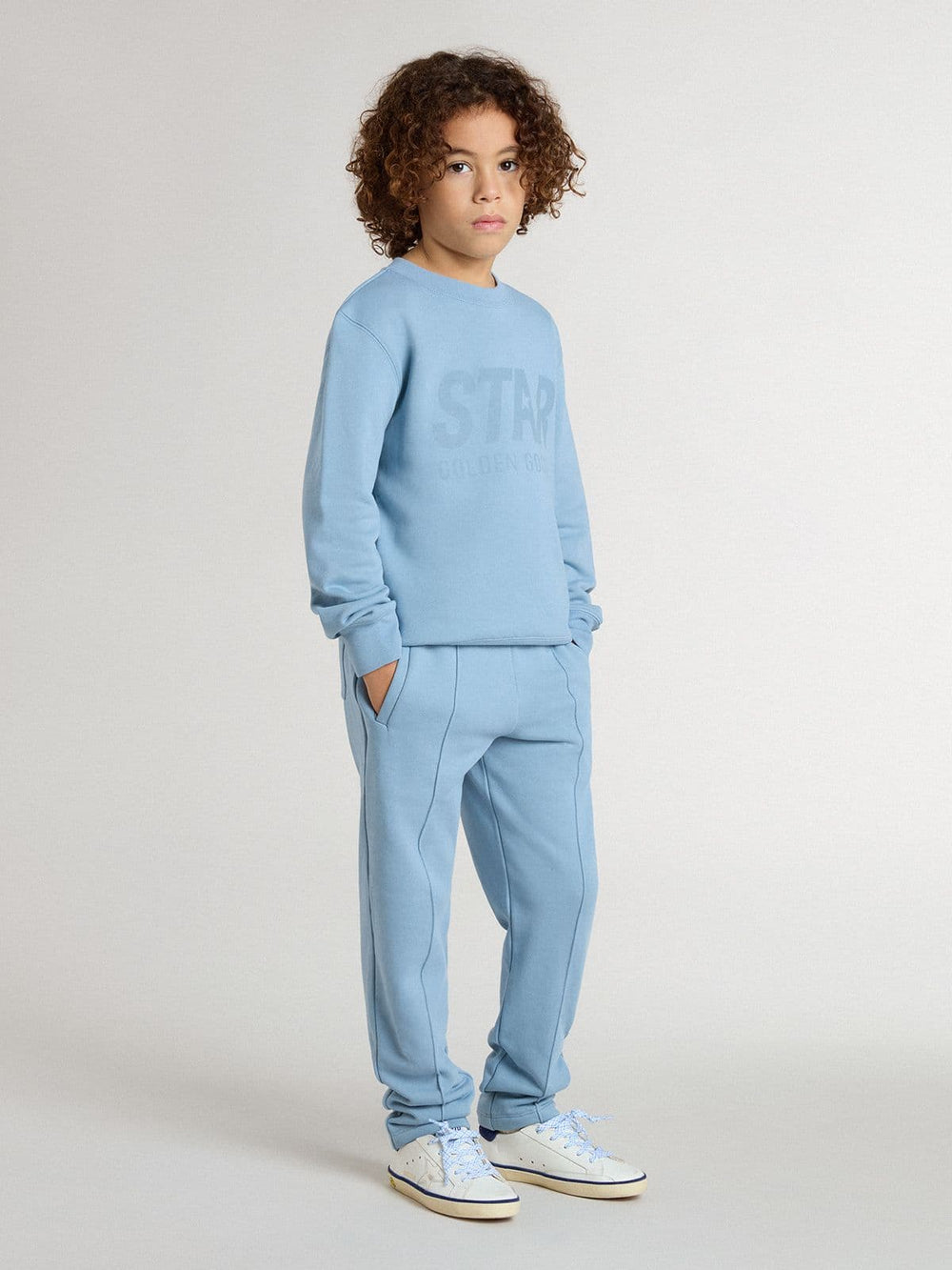 Boys' light blue sweatshirt with lettering on the front