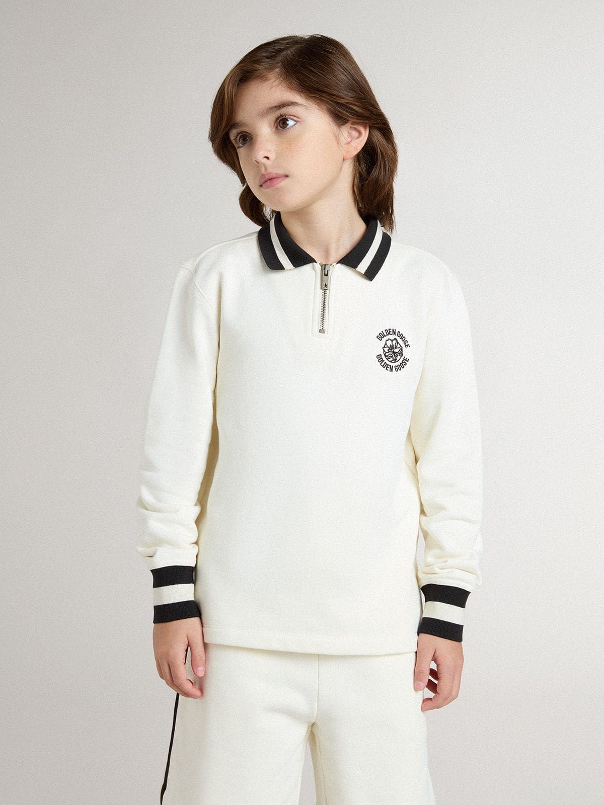 Kids white cotton polo sweatshirt with embroidery on the chest and print on the back