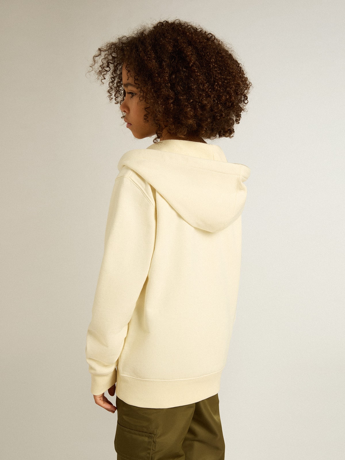 Hooded sweatshirt in worn white with Golden embroidery on the front