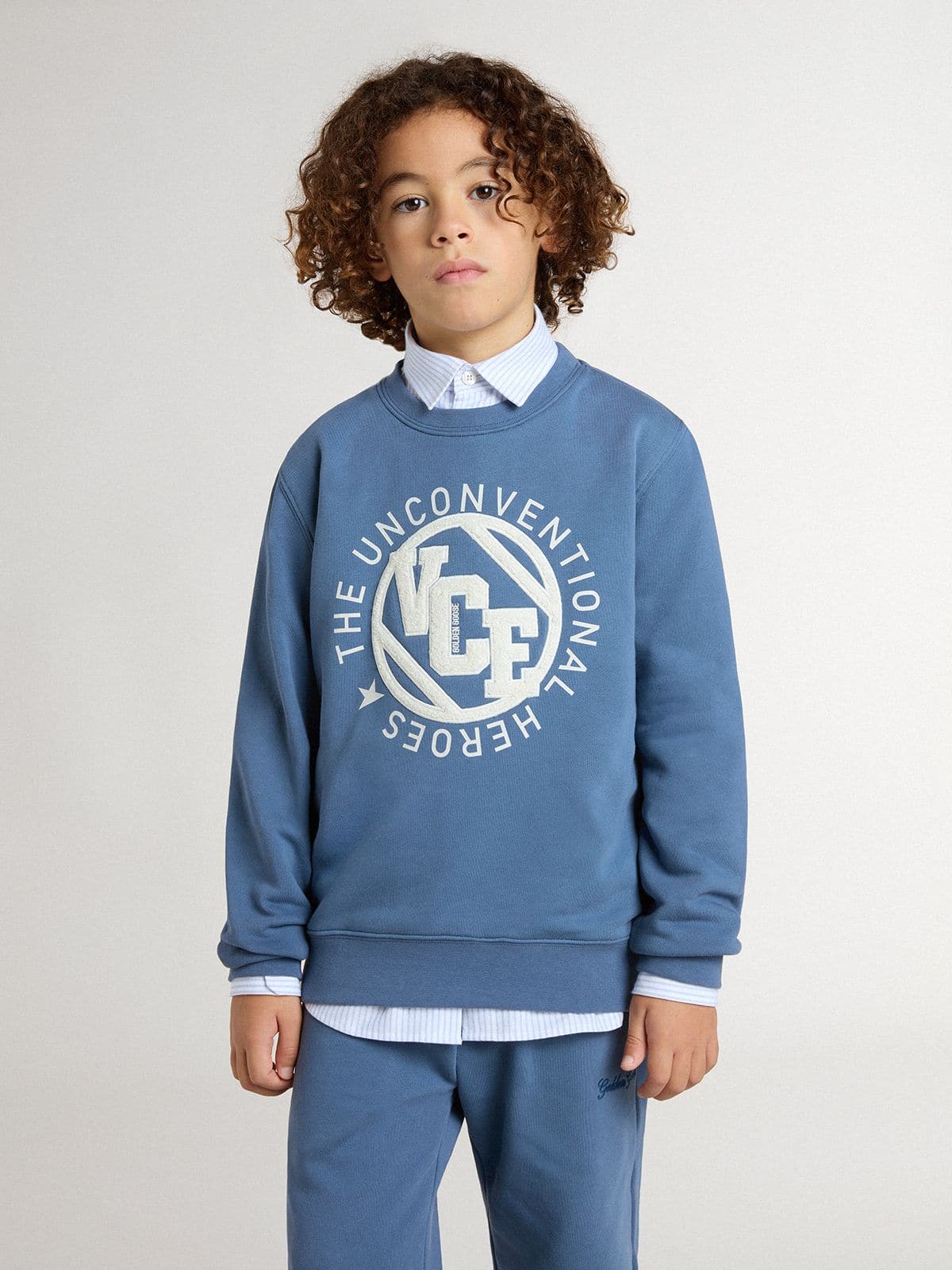 Kids’ blue sweatshirt with white embossed patches