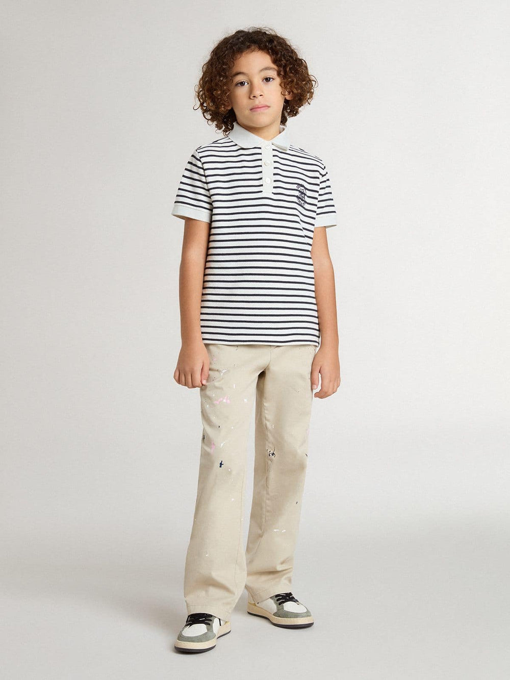 Boys' white cotton polo with navy blue stripes and embroidery