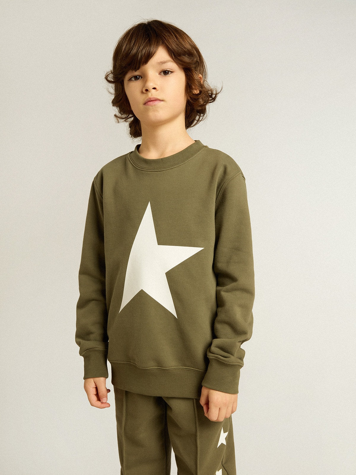 Boys' dark green sweatshirt with white maxi star on the front
