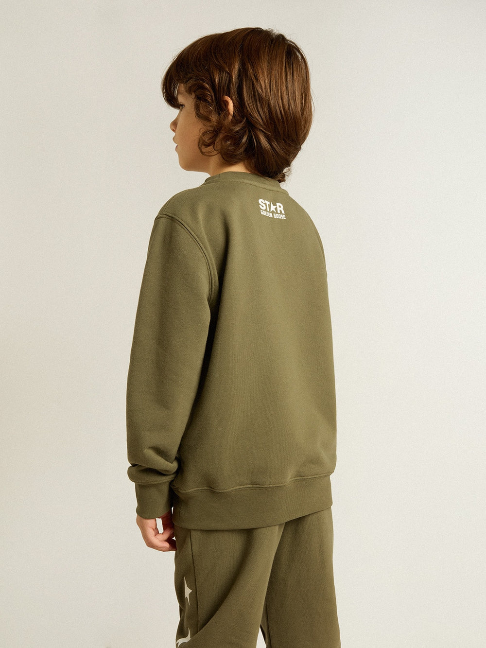 Boys' dark green sweatshirt with white maxi star on the front