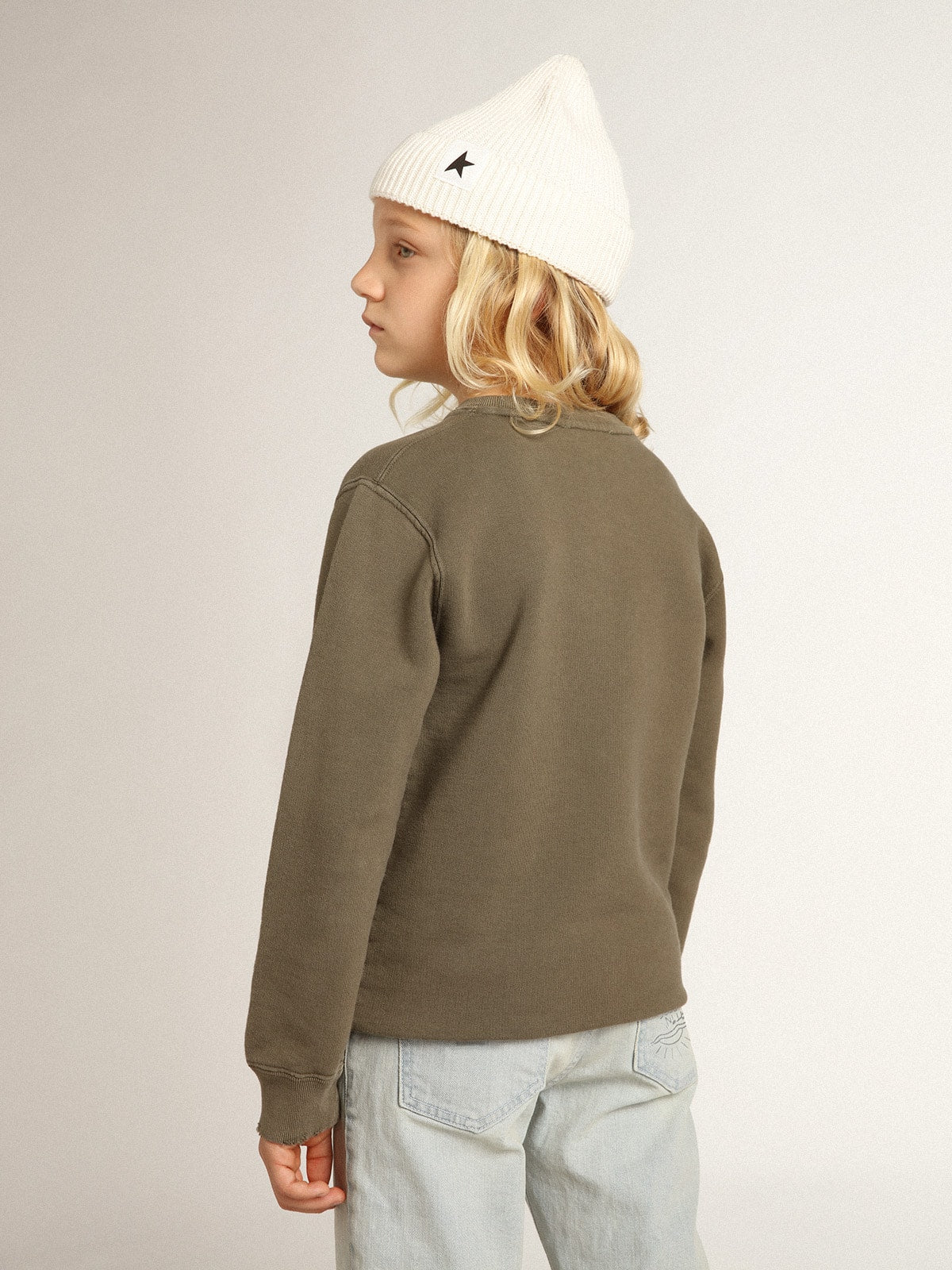 Distressed olive-green sweatshirt with Golden lettering on the front