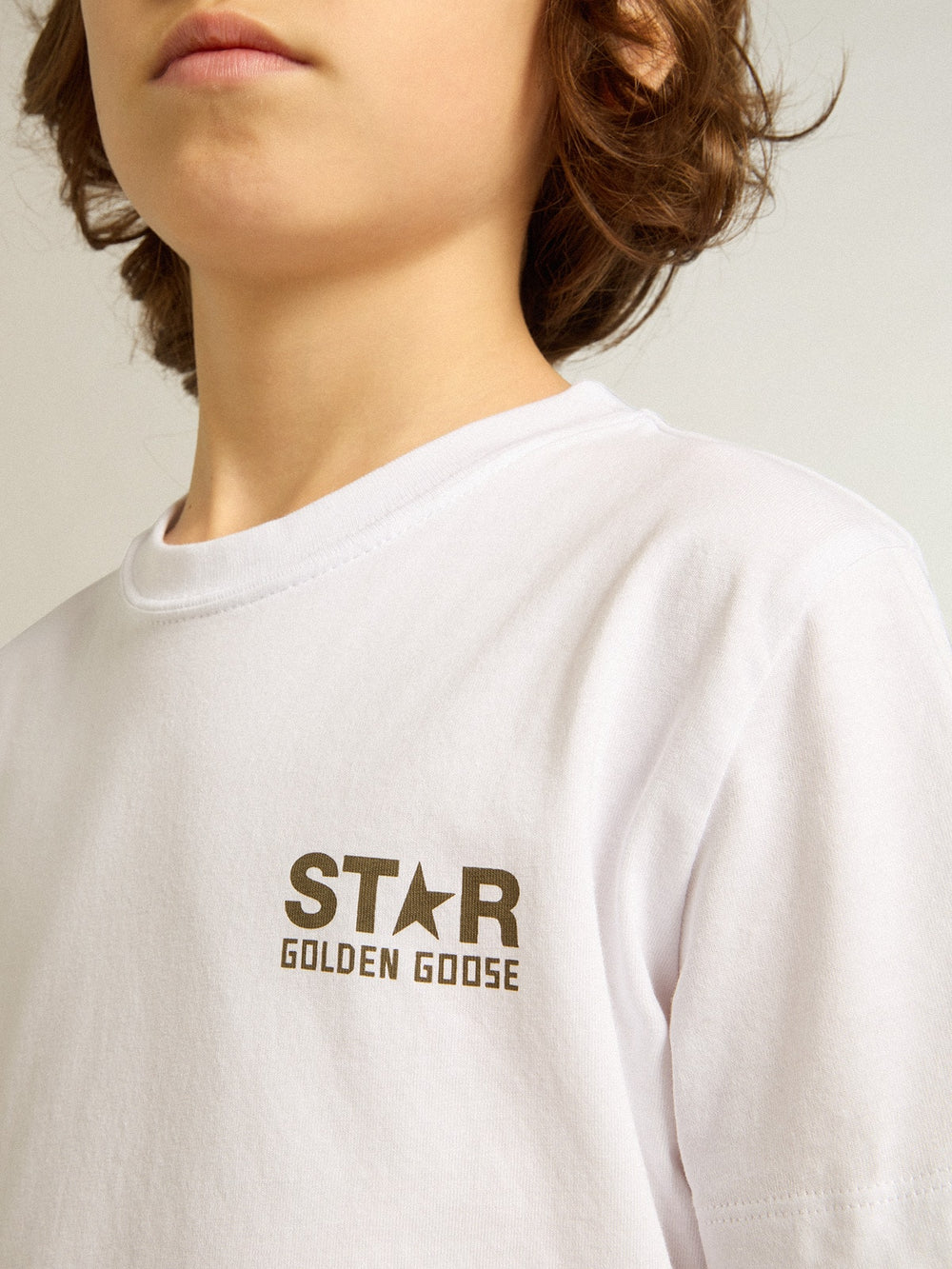 Boys' white T-shirt with contrasting dark green logo and star