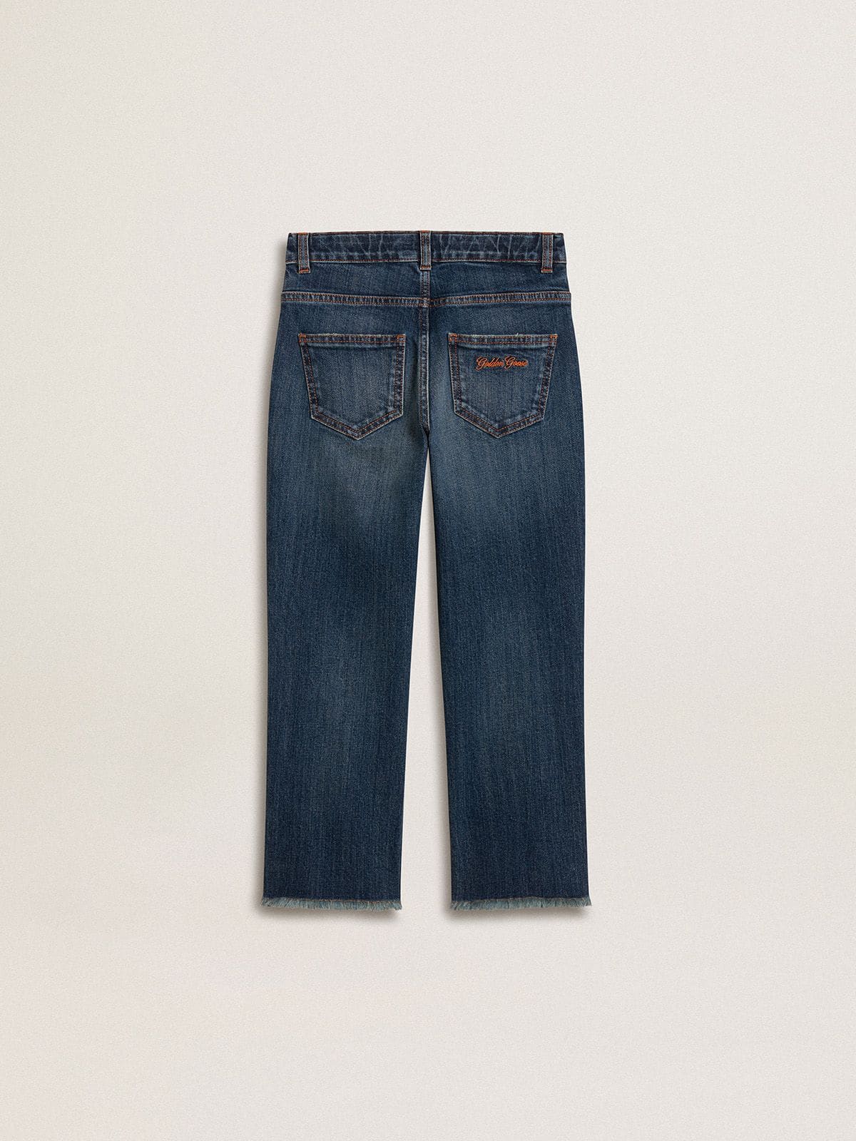 Boys' denim jeans with a raw edge and embroidery