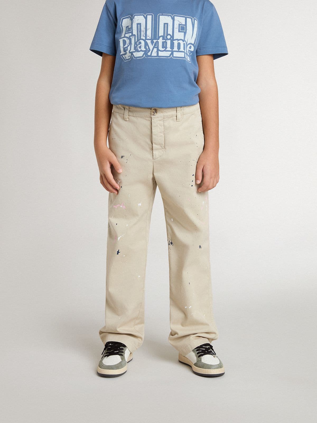 Kids’ beige chino pants with multicolor splashes