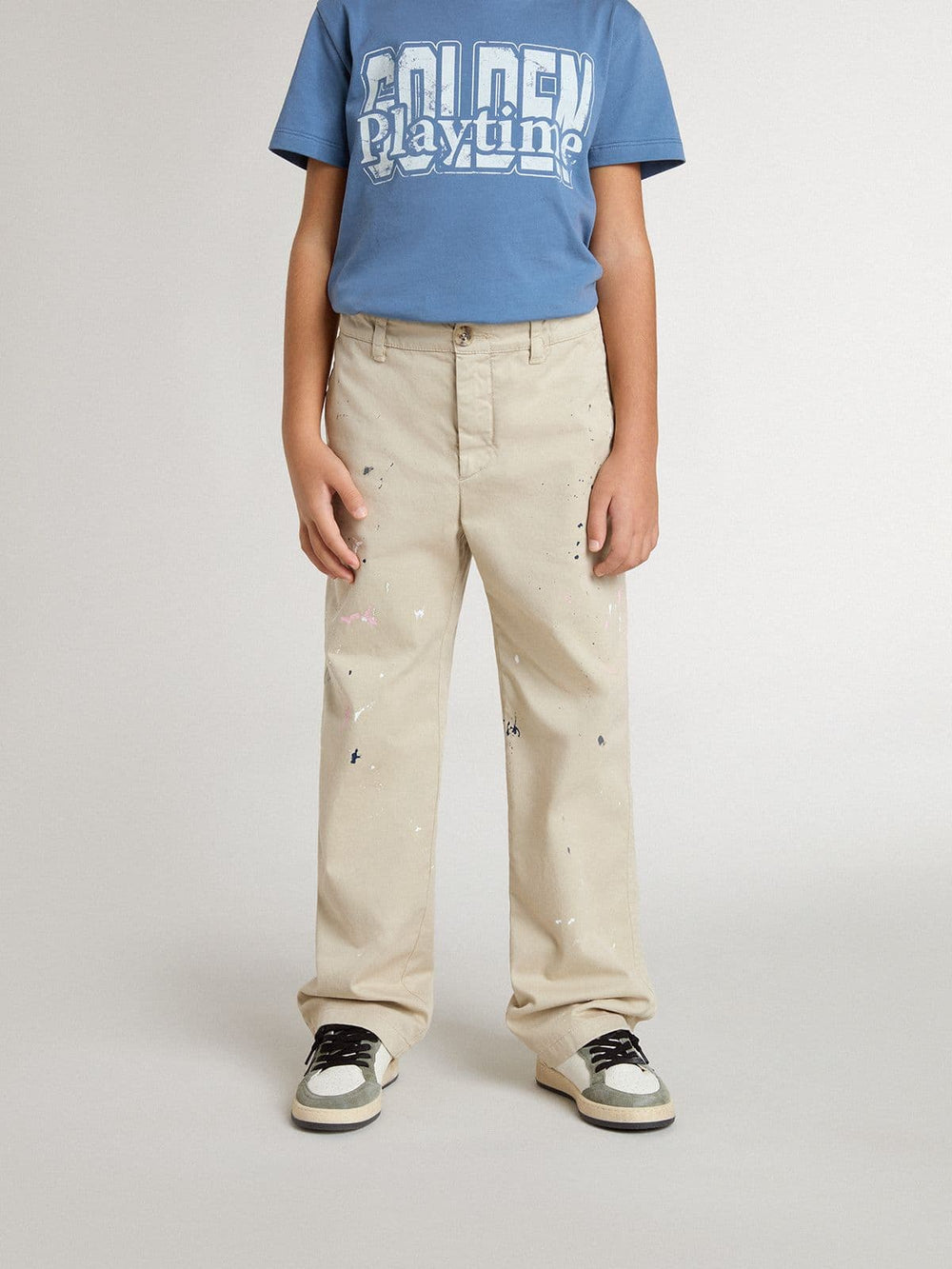 Kids’ beige chino pants with multicolor splashes