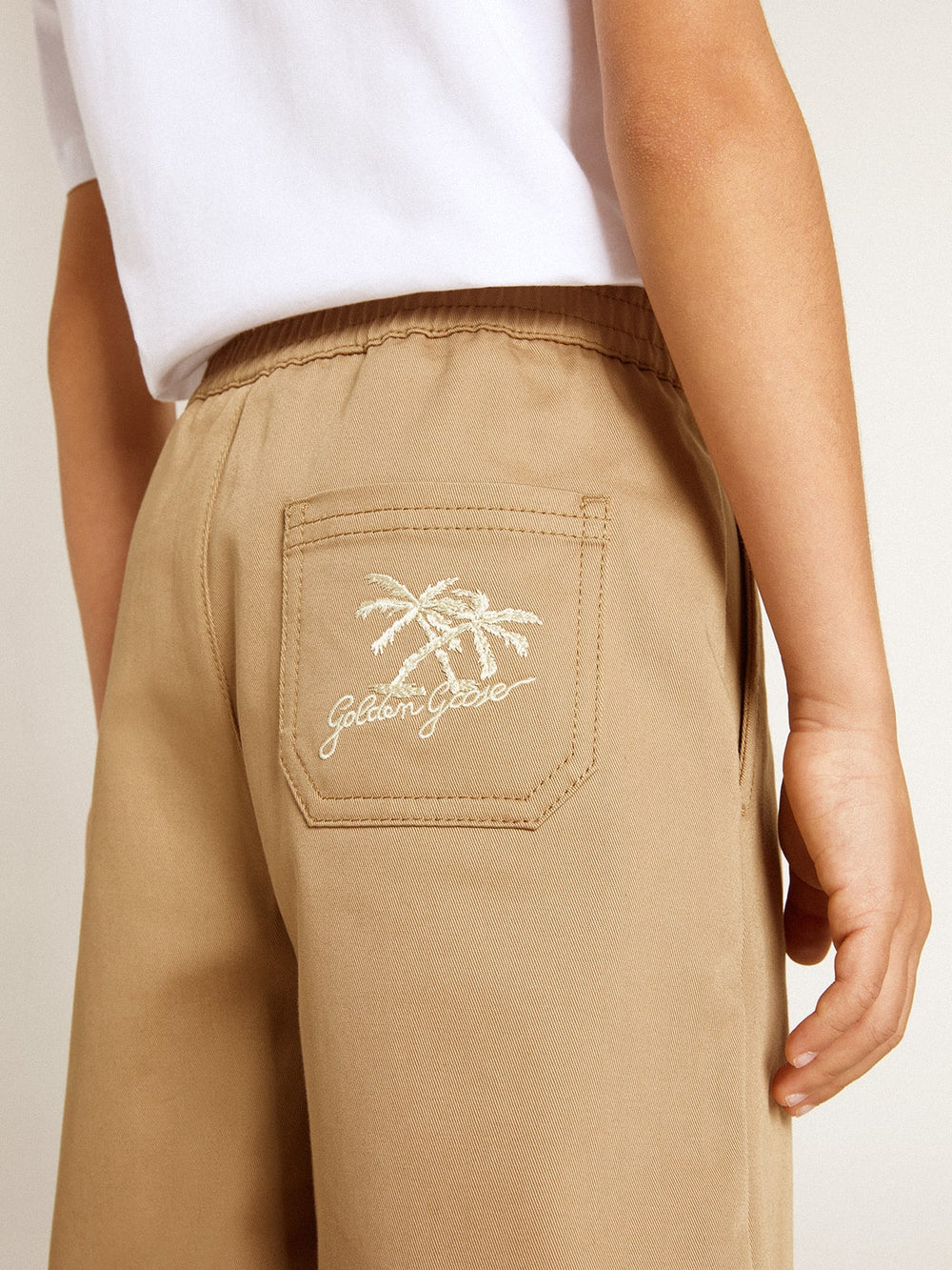 Boys' shorts in beige cotton