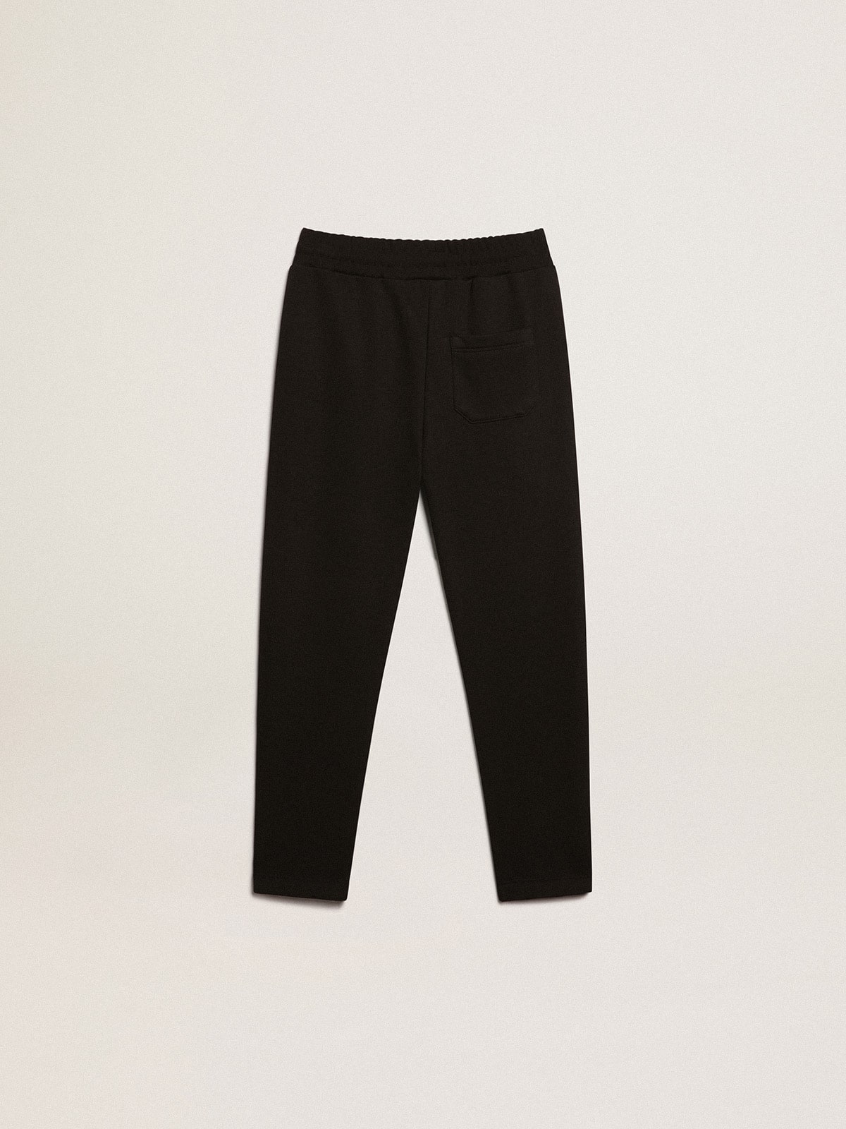 Boys’ black joggers with white stars