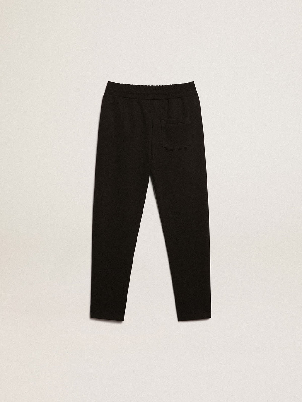 Boys’ black joggers with white stars