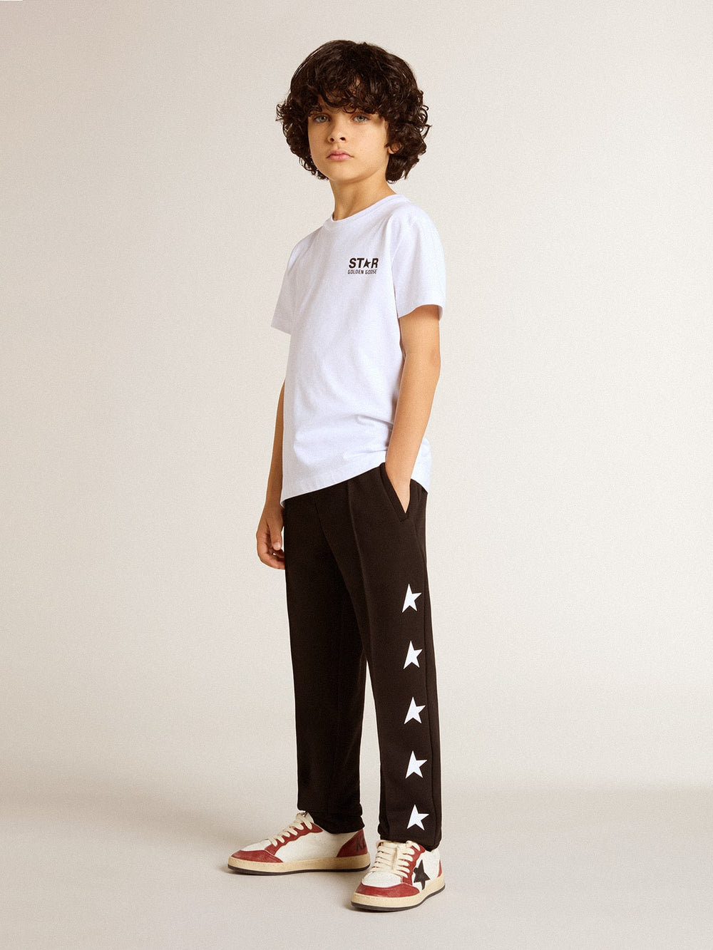 Boys’ black joggers with white stars