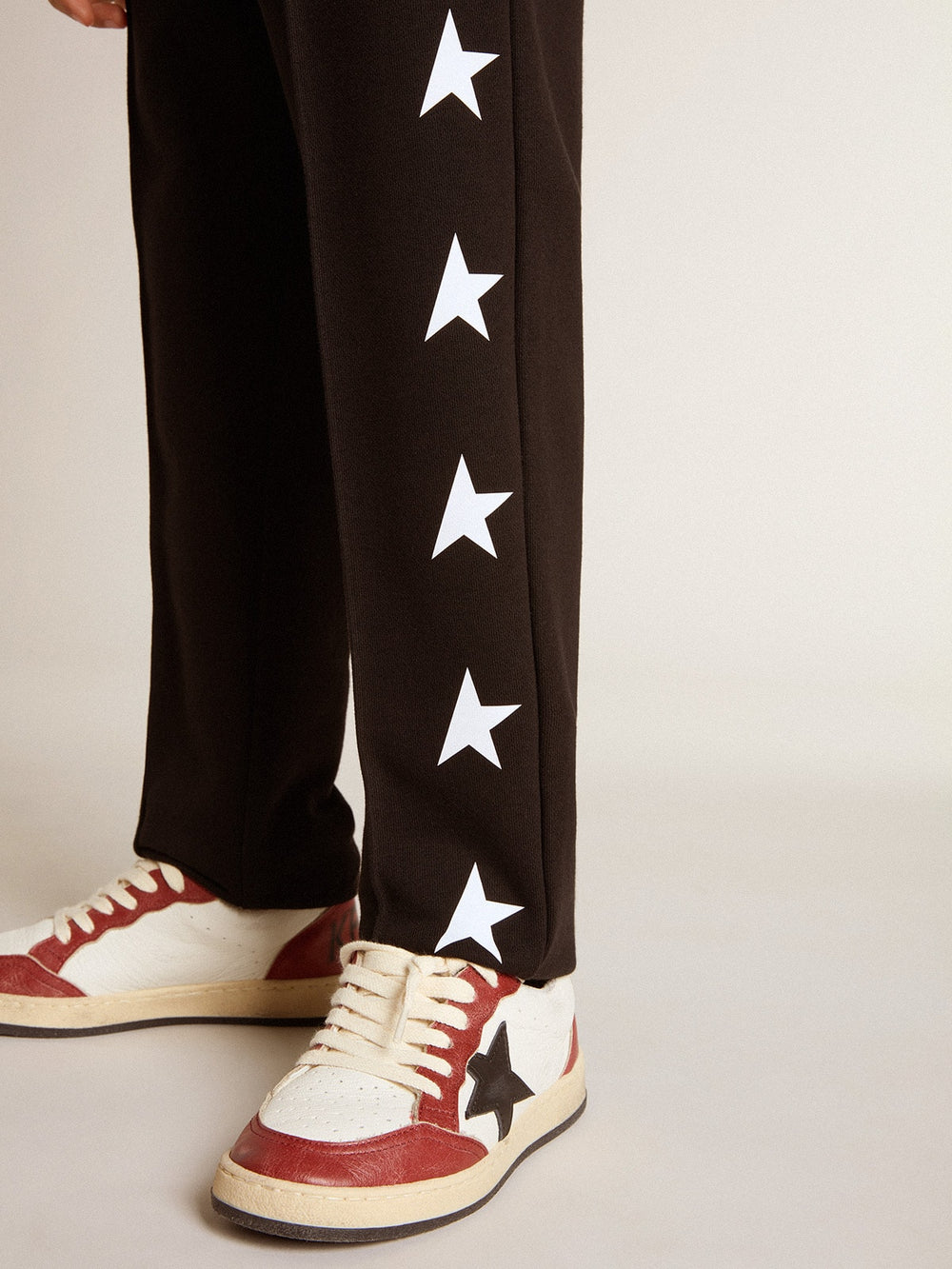 Boys’ black joggers with white stars