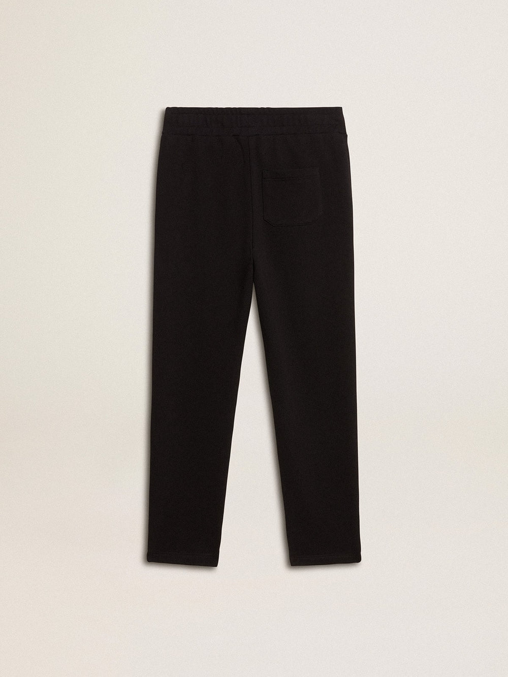 Boys’ black joggers with white stars