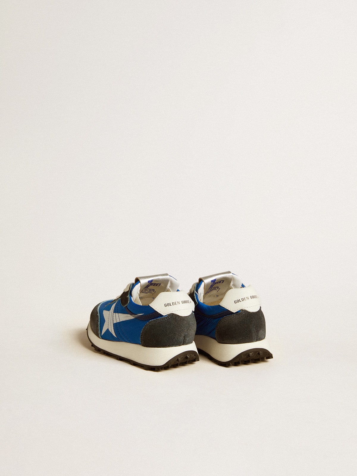 Marathon Junior in blue nylon with printed star and leather heel tab