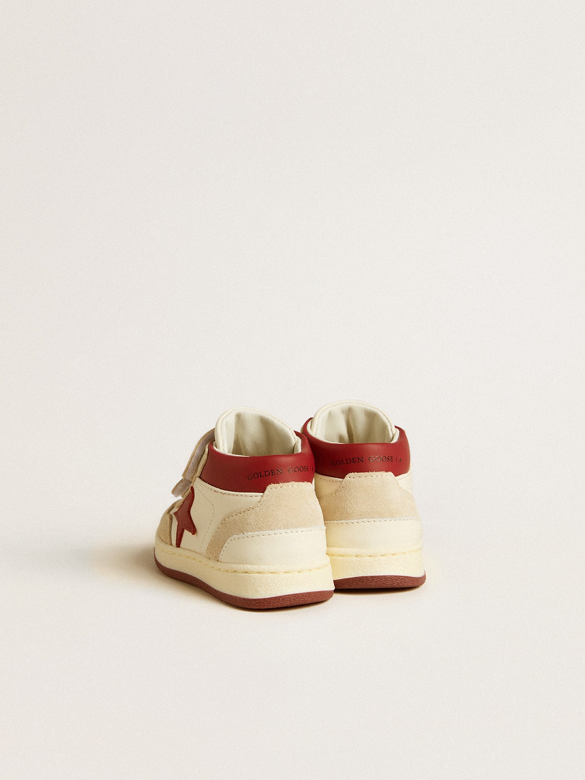 June Junior in nappa and suede with red leather star and heel tab