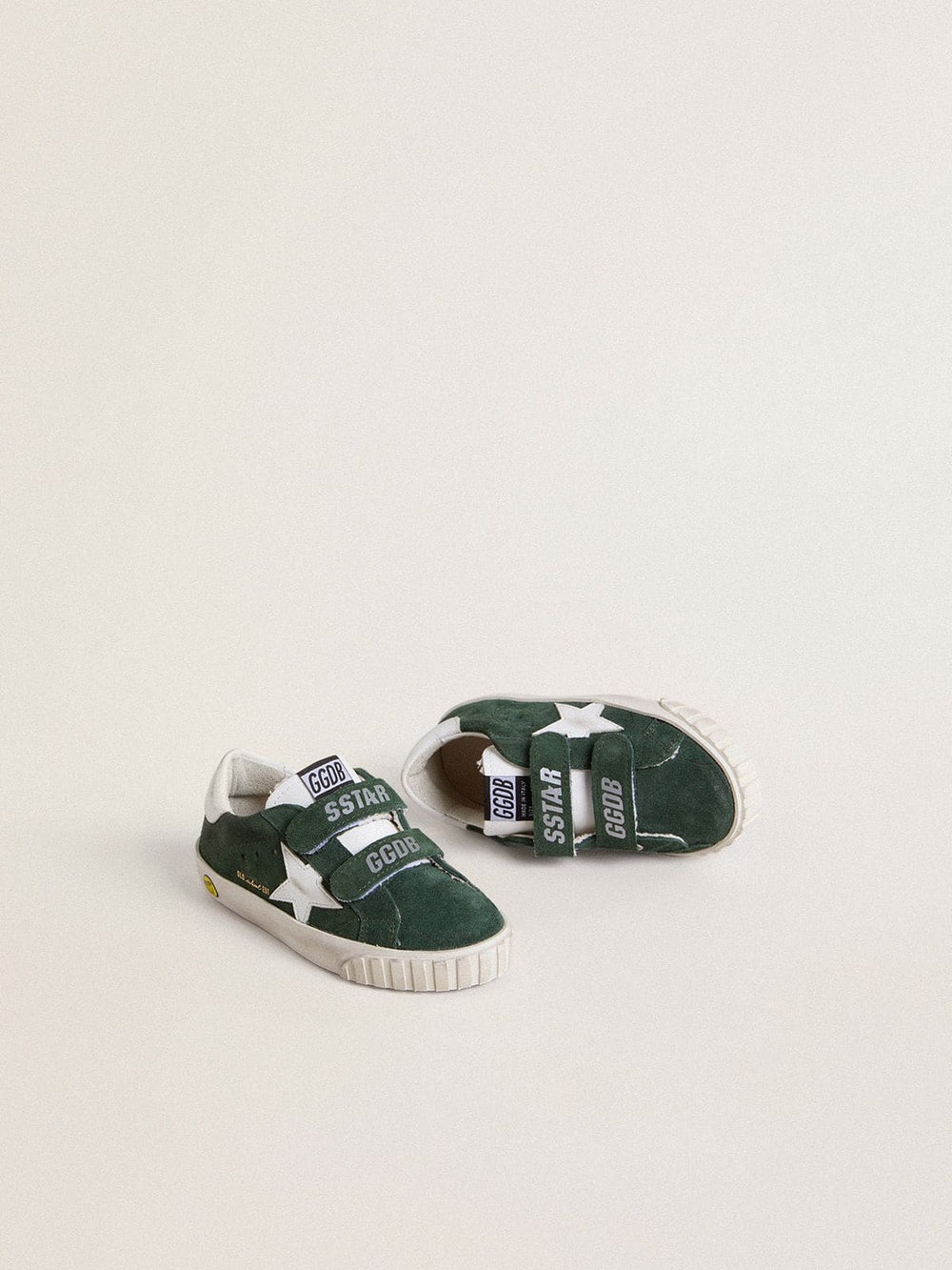 Old School Junior in green suede with white leather star and heel tab