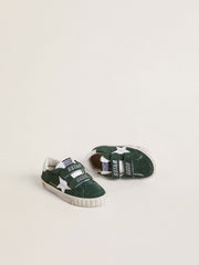 Old School Junior in green suede with white leather star and heel tab