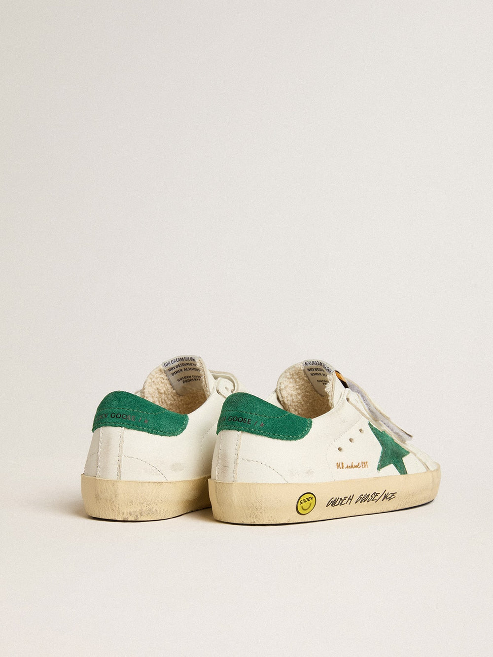 Old School Young with green suede star and heel tab