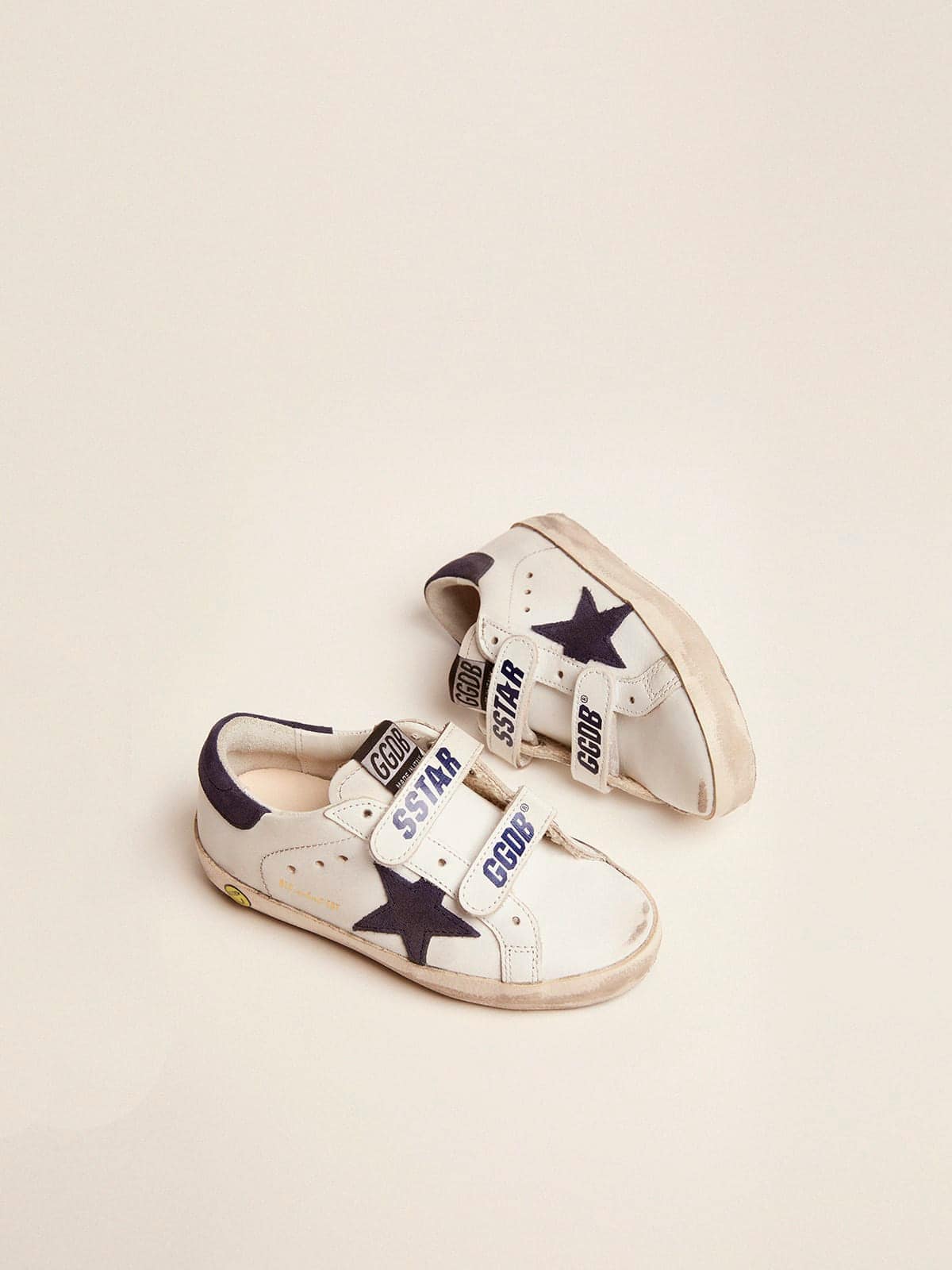 Old School Young in white leather with blue suede star and heel tab