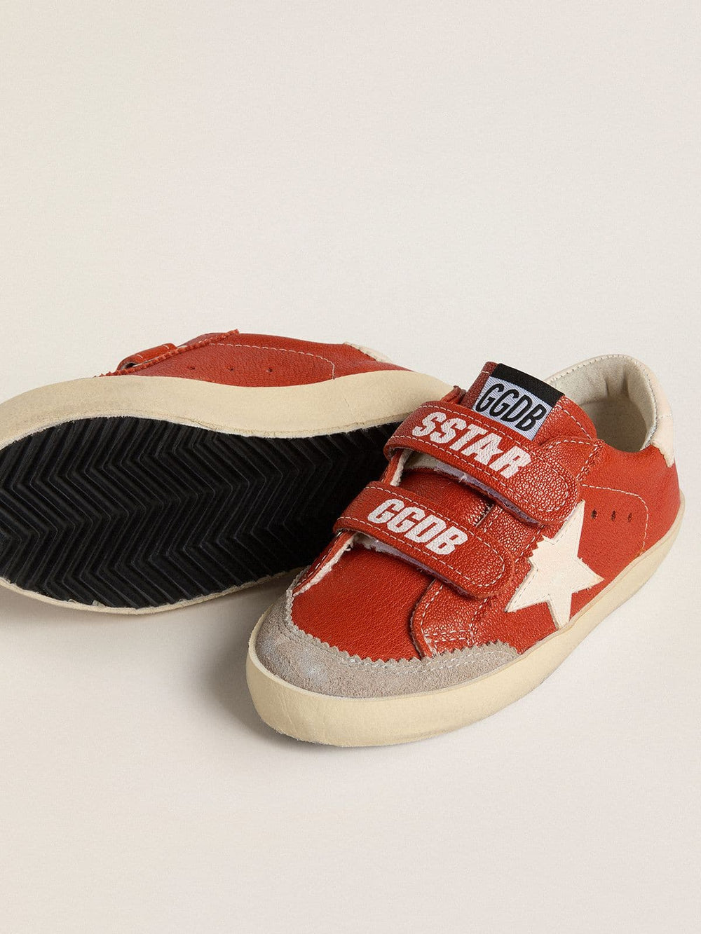 Teen Old School in orange nappa with white star and cream-colored leather heel tab