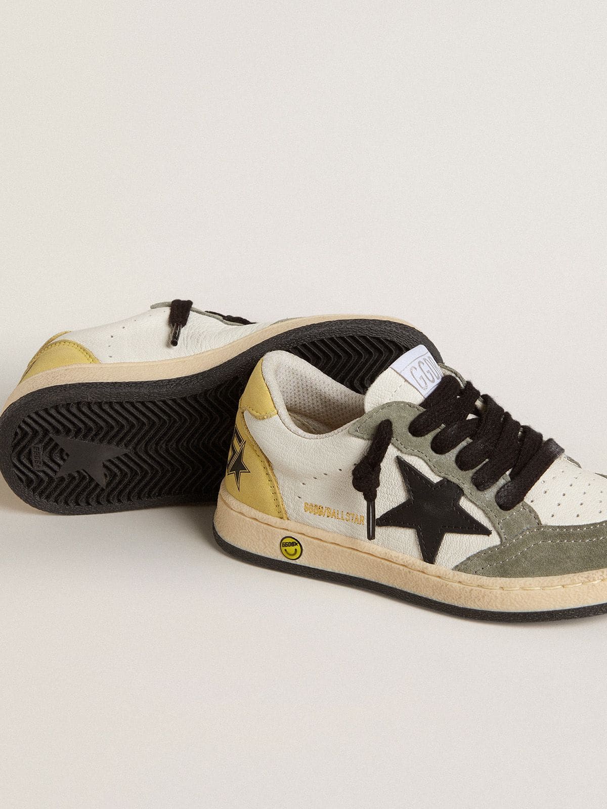 Ball Star Young in white nappa with dark green suede inserts and black star